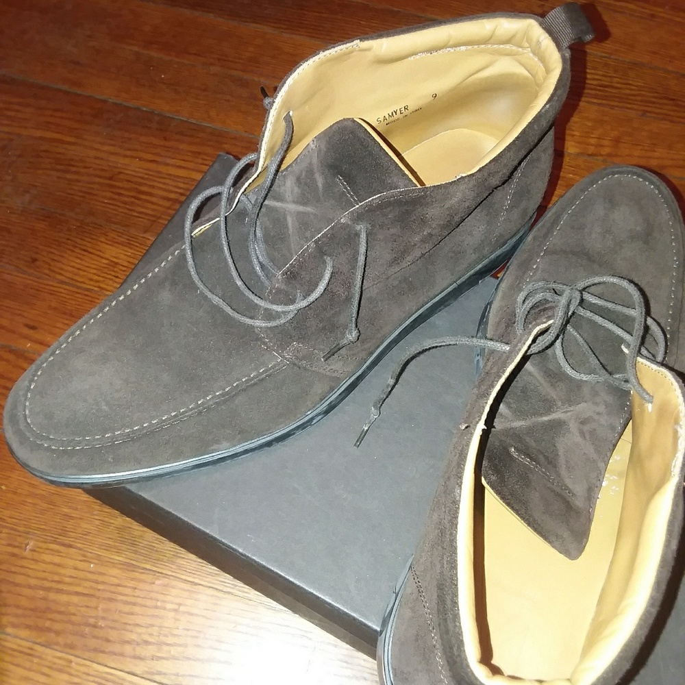 A pair of Chocolate Brown mens suede ankle boots.